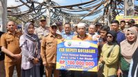 Pemkab Serahkan Simbolis Bantuan Relokasi Rp 700 Juta Untuk Korban Kebakaran Pasar Kotabaru