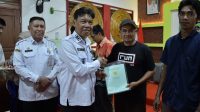 Wabup HSS Serahkan Sertifikat PTSL, 52 Bidang Tanah Milik Masyarakat Telaga Langsat Resmi Bersertifikat